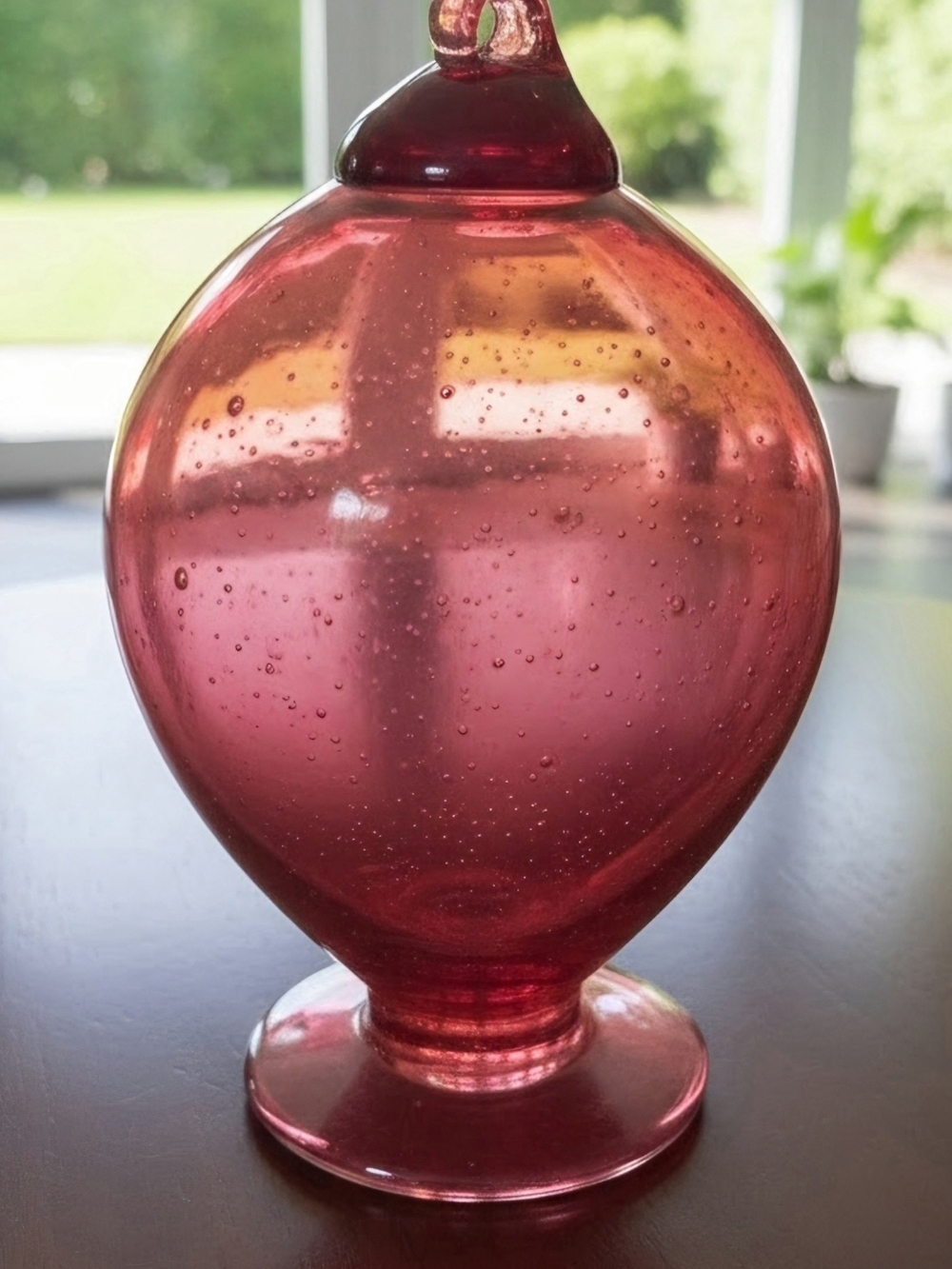 Vintage cranberry handblown glass or 7 in tall and 4 inch wide. Beautiful.